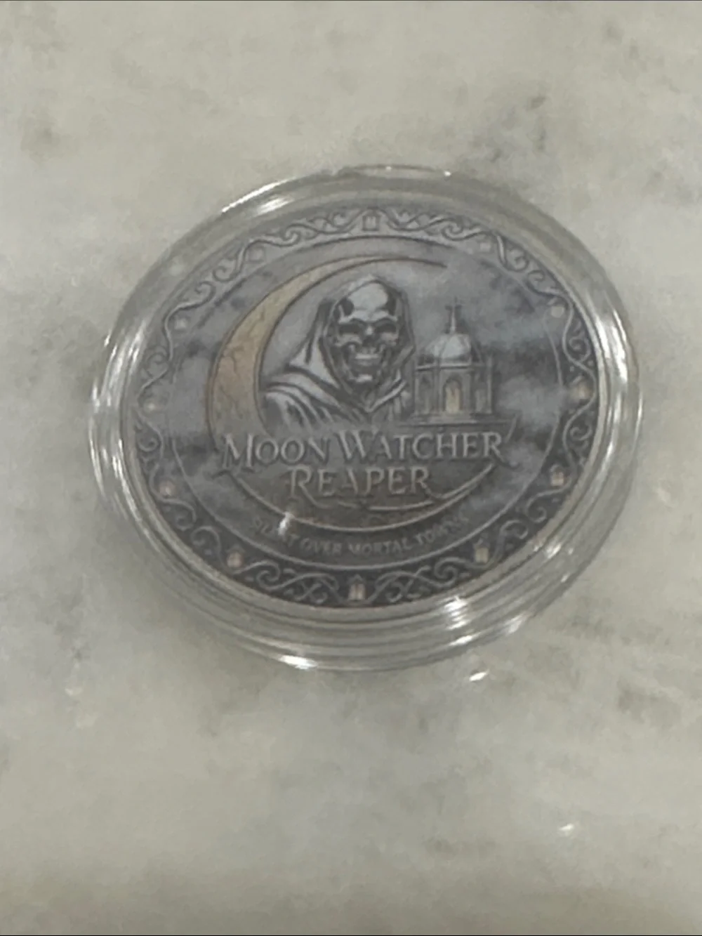 The Watcher of Mortal Cities Art Coin - Blue/Gray